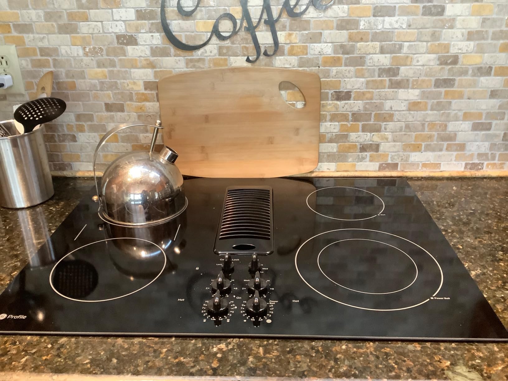 GE PP9830DJBB 30 Inch Smoothtop Electric Cooktop with 4 Burners, 3-Speed Downdraft Exhaust System, 9