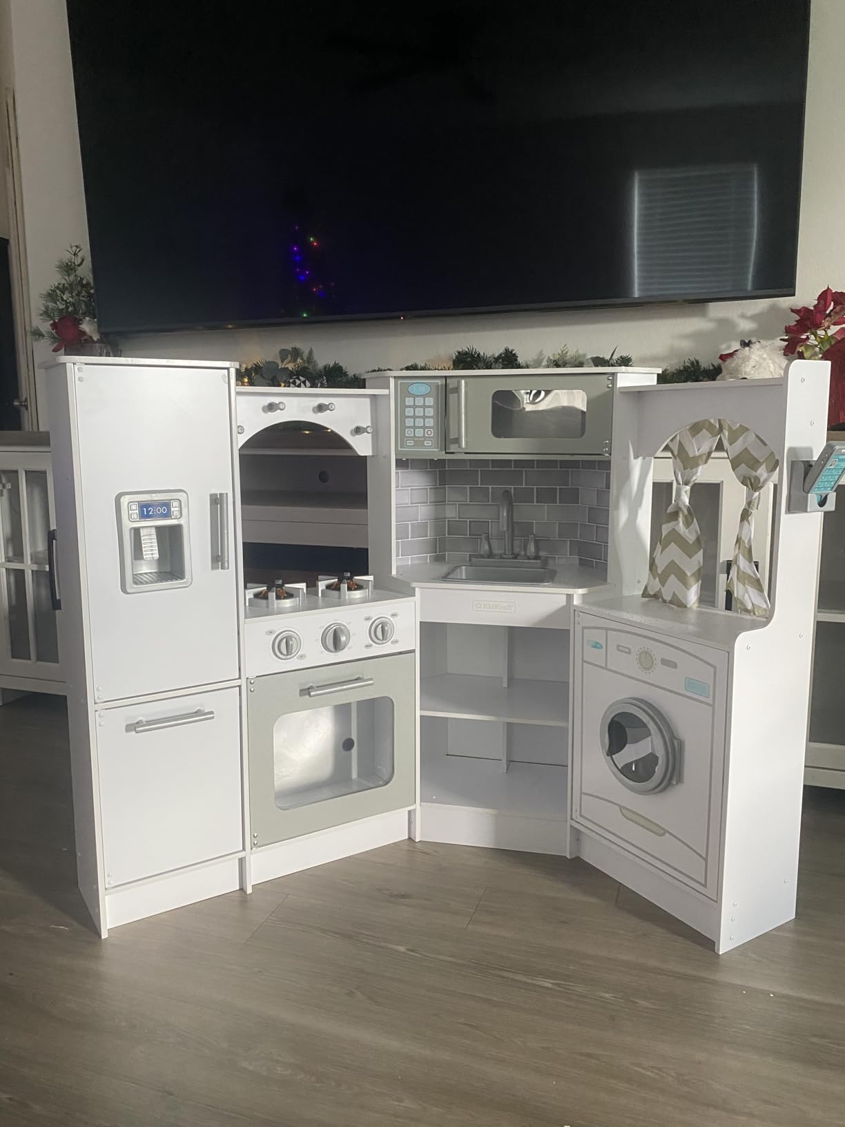 KidKraft Ultimate Corner Wooden Play Kitchen with Lights & Sounds, Play Phone and Curtains, White Customer Review KidKraft Ultimate Corner Wooden Play Kitchen with Lights & Sounds, Play Phone and Curtains, White - Customer Photo 5