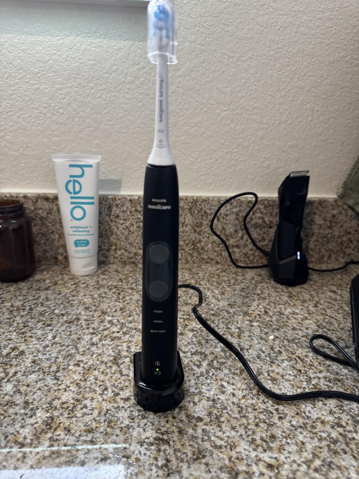 Philips Sonicare ProtectiveClean 5300 Rechargeable Electric Toothbrush, with Pressure Sensor, 3 Cleaning Modes, SmarTimer and QuadPacer, with 2 Bonus Brush Heads, Travel Case, Black, Model HX6423/34 customer photo 2