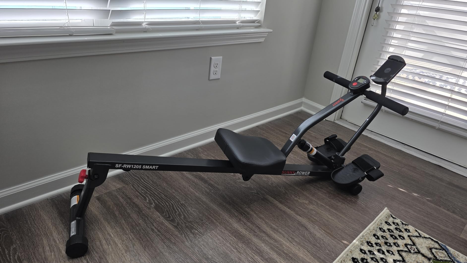 Sunny Health & Fitness Compact Adjustable Rowing Machine with 12 Levels of Resistance customer photo 1
