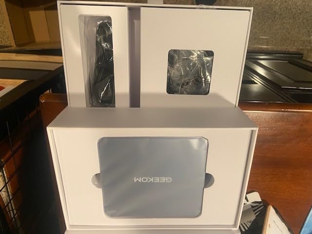 GEEKOM AX8 Max Mini PC with AMD Ryzen 7 8745HS Dual 2.5GbE Lan Port, 32GB DDR5(Upgradable), 1TB NVMe SSD(Expandable), Radeon 780M, USB4.0(40Gbps), Quad Display, Windows 11 Pro Gaming, Office, Video Editing customer photo 1