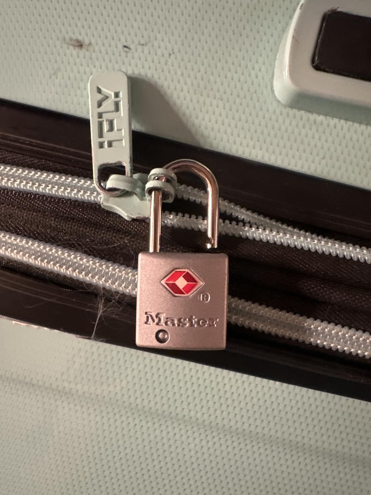 Master Lock Brass TSA Locks for Luggage with Key, TSA Approved Keyed Padlock for Backpacks, Suitcases, and Luggage, Zipper Lock, 4 Pack, 4683Q customer photo 1