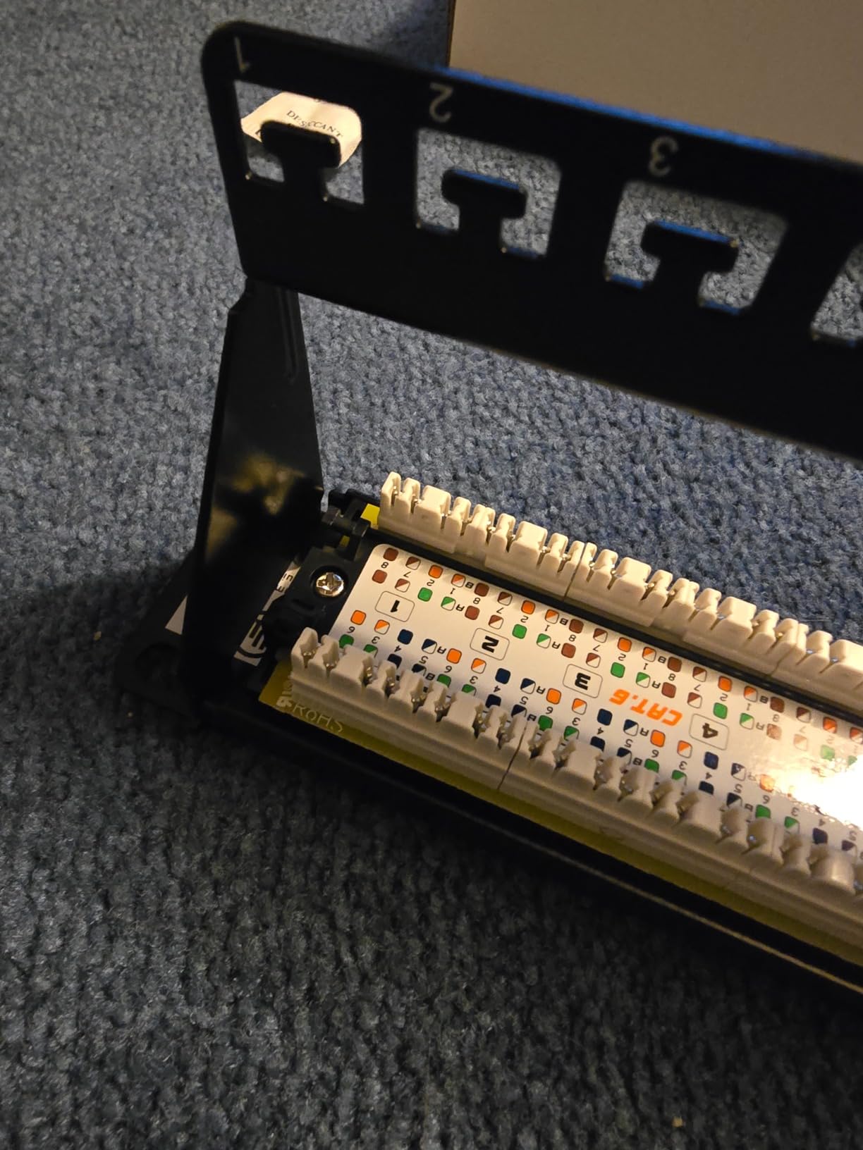 Cable Matters [UL Listed] 24 Port Patch Panel Rackmount or Wall Mount 19-Inch, 1U Cat6 Network Patch Panel for 10 Gigabit Ethernet, 110 or Krone Impact Tools Compatible customer photo 1