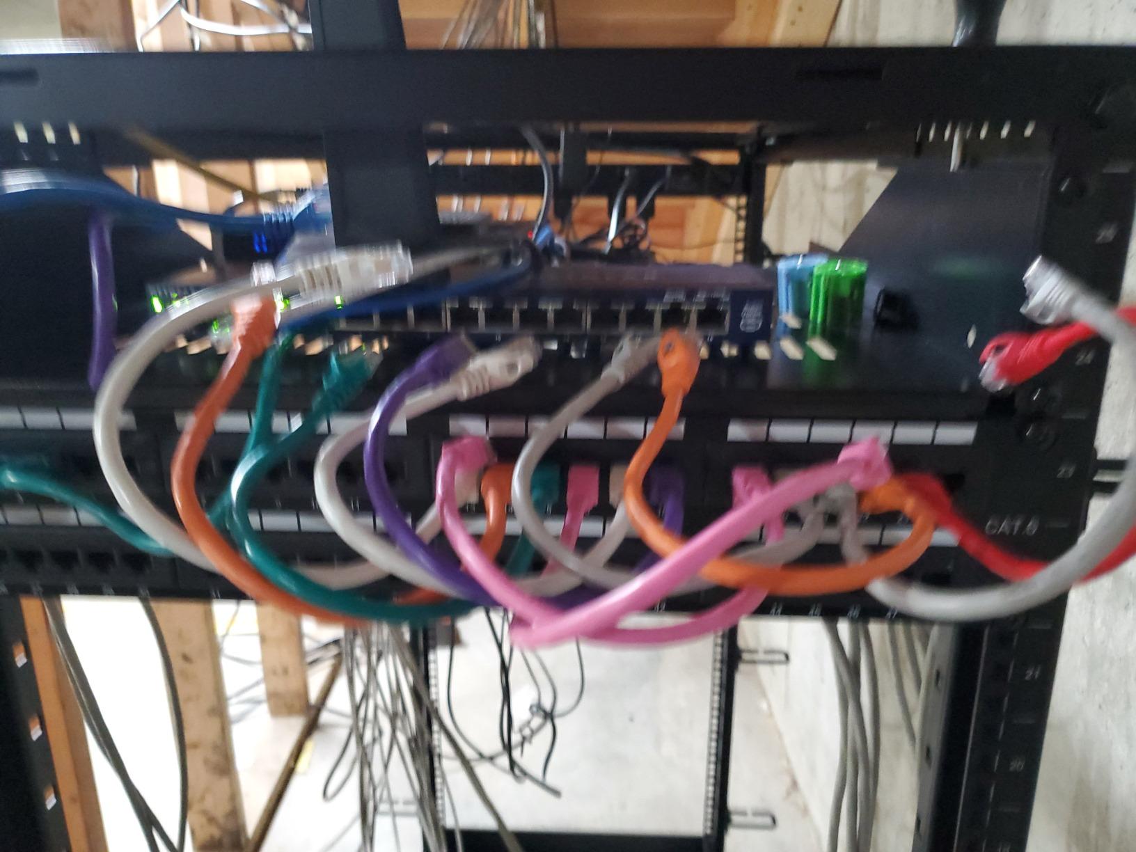 Cable Matters [UL Listed] 48 Port Patch Panel Rackmount or Wall Mount 19-Inch, 2U Cat6 Network Patch Panel for 10 Gigabit Ethernet, 110 or Krone Impact Tools Compatible customer photo 1