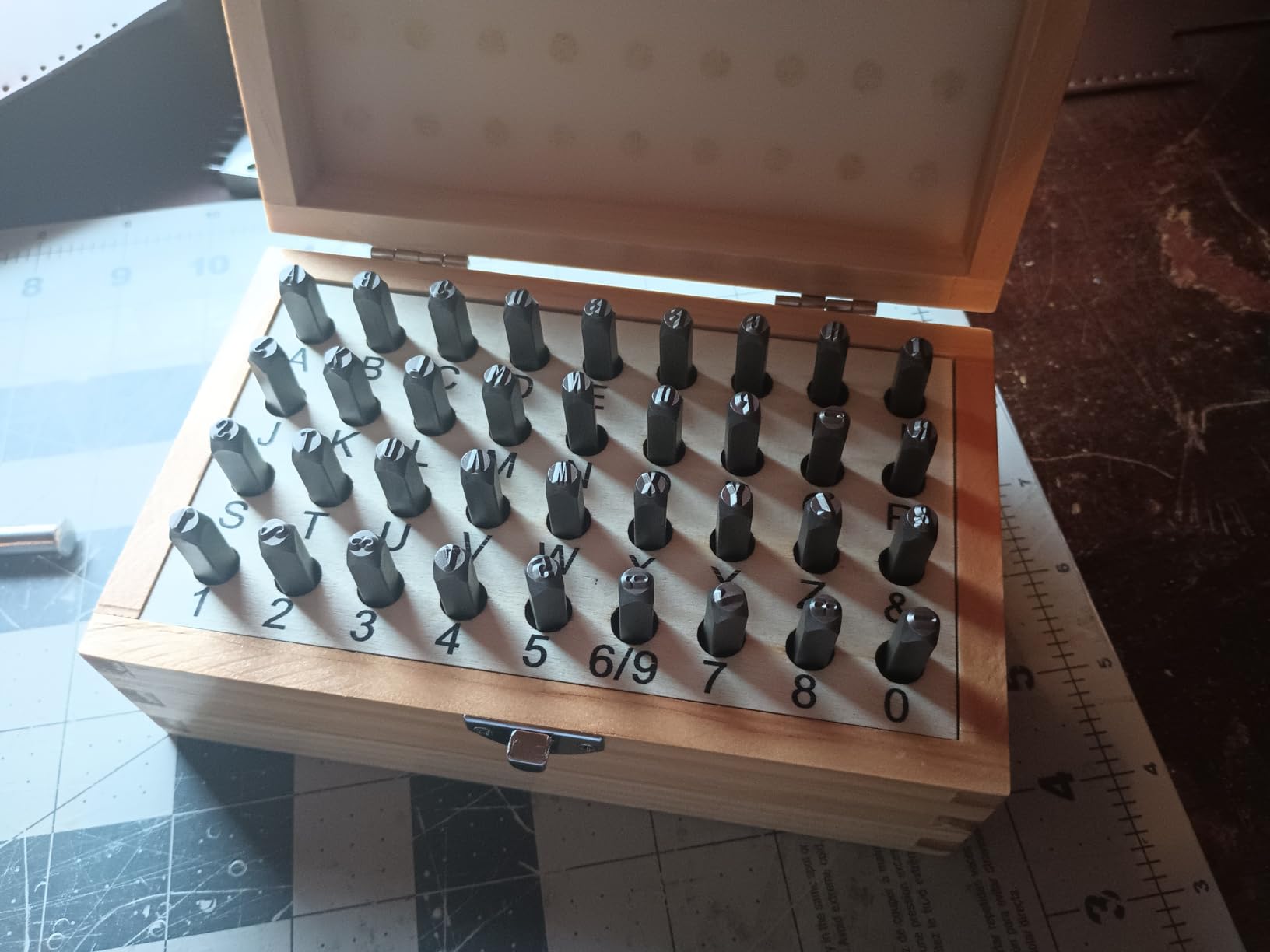 Amazon Basics Metal Stamping Kit, Alphabet and Number Stamps, 36-Piece Set with Wood Storage Case, 5/16 inch, for Leather, Wood, Metal Crafting customer photo 2