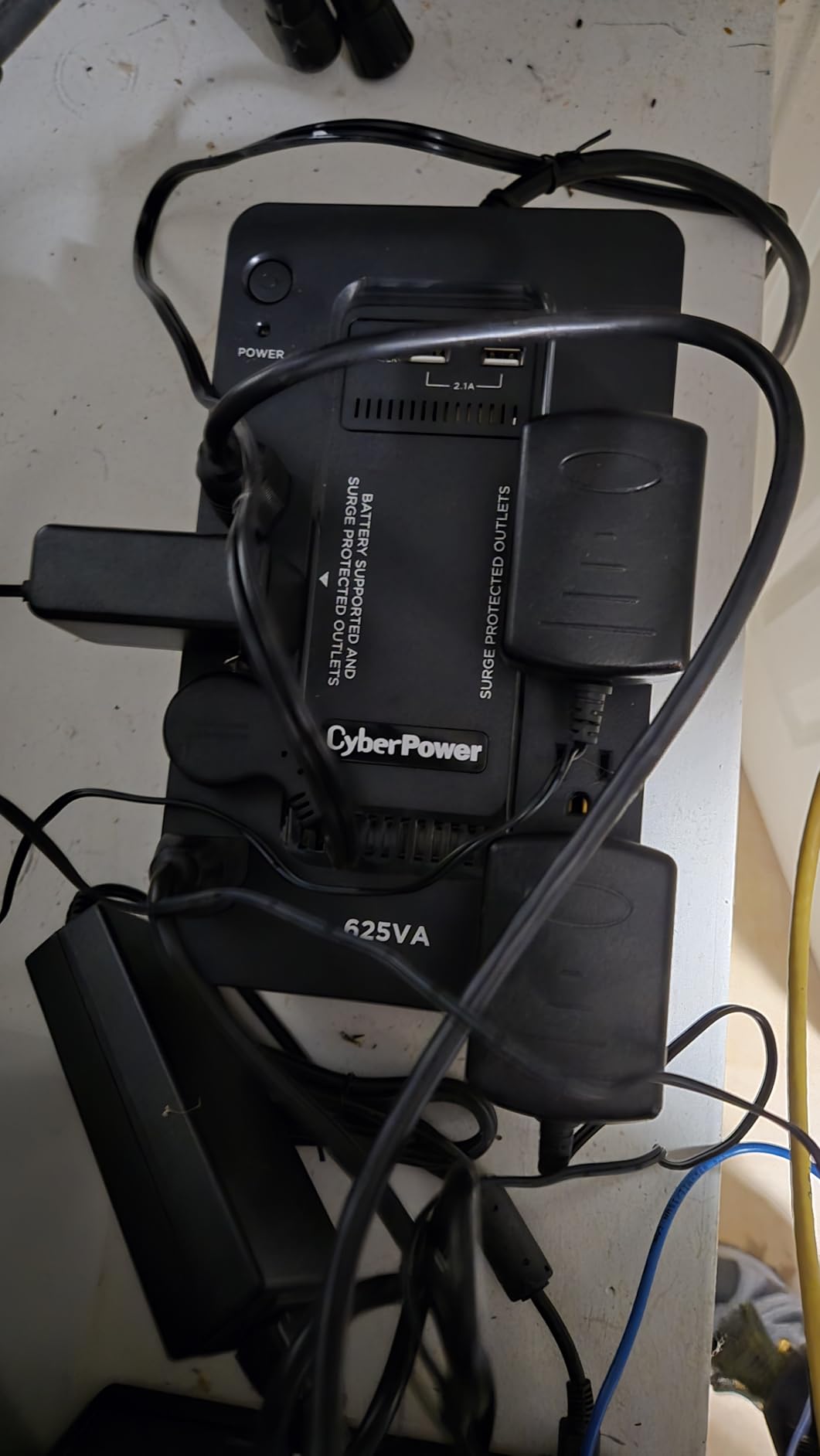 CyberPower ST625U Standby UPS Battery Backup and Surge Protector, 625VA/360W, 8 Outlets, 2 USB Charging Ports, Compact, UL Certified customer photo 1