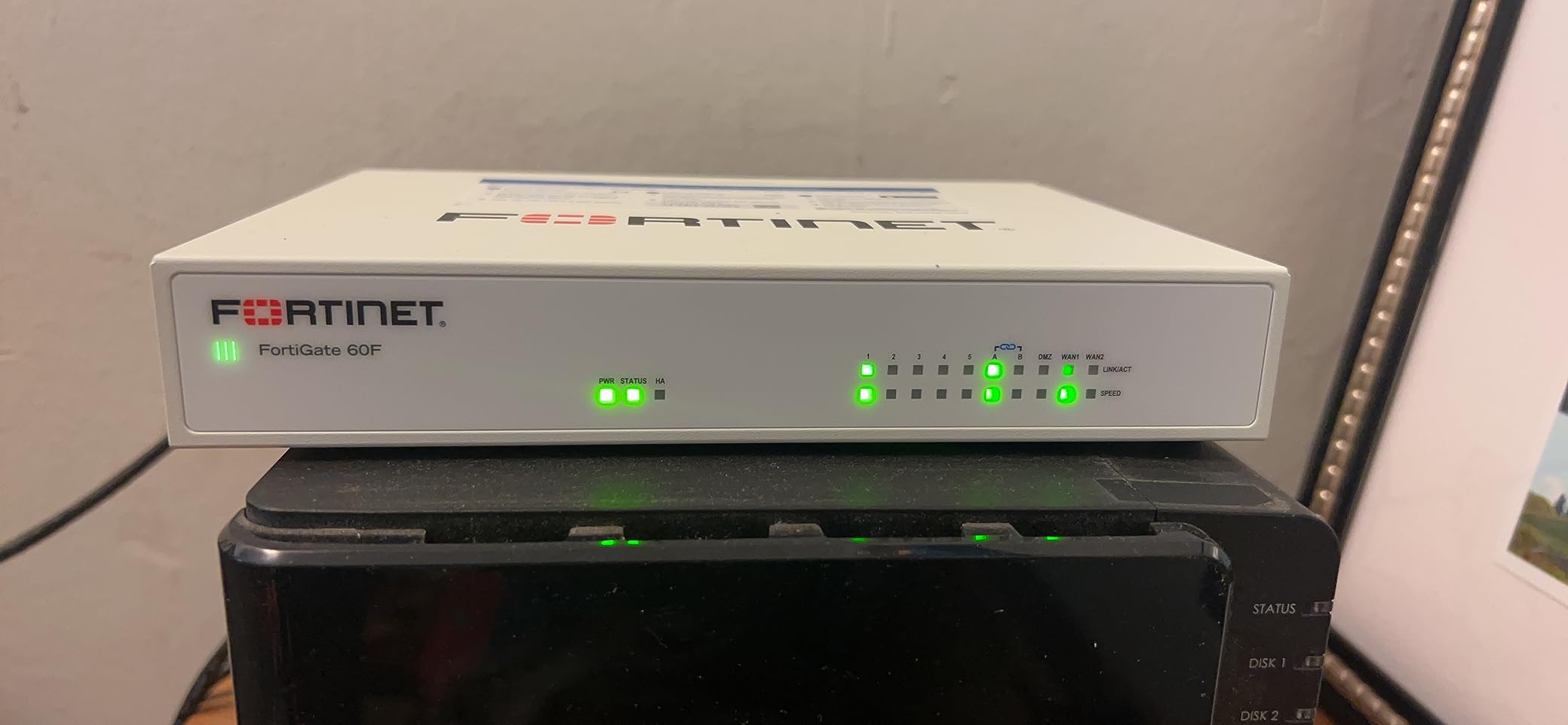 FortiGate-60F Network Security Appliance Plus 1 Year FortiGuard Unified Threat Protection (UTP) and FortiCare Premium customer photo 1