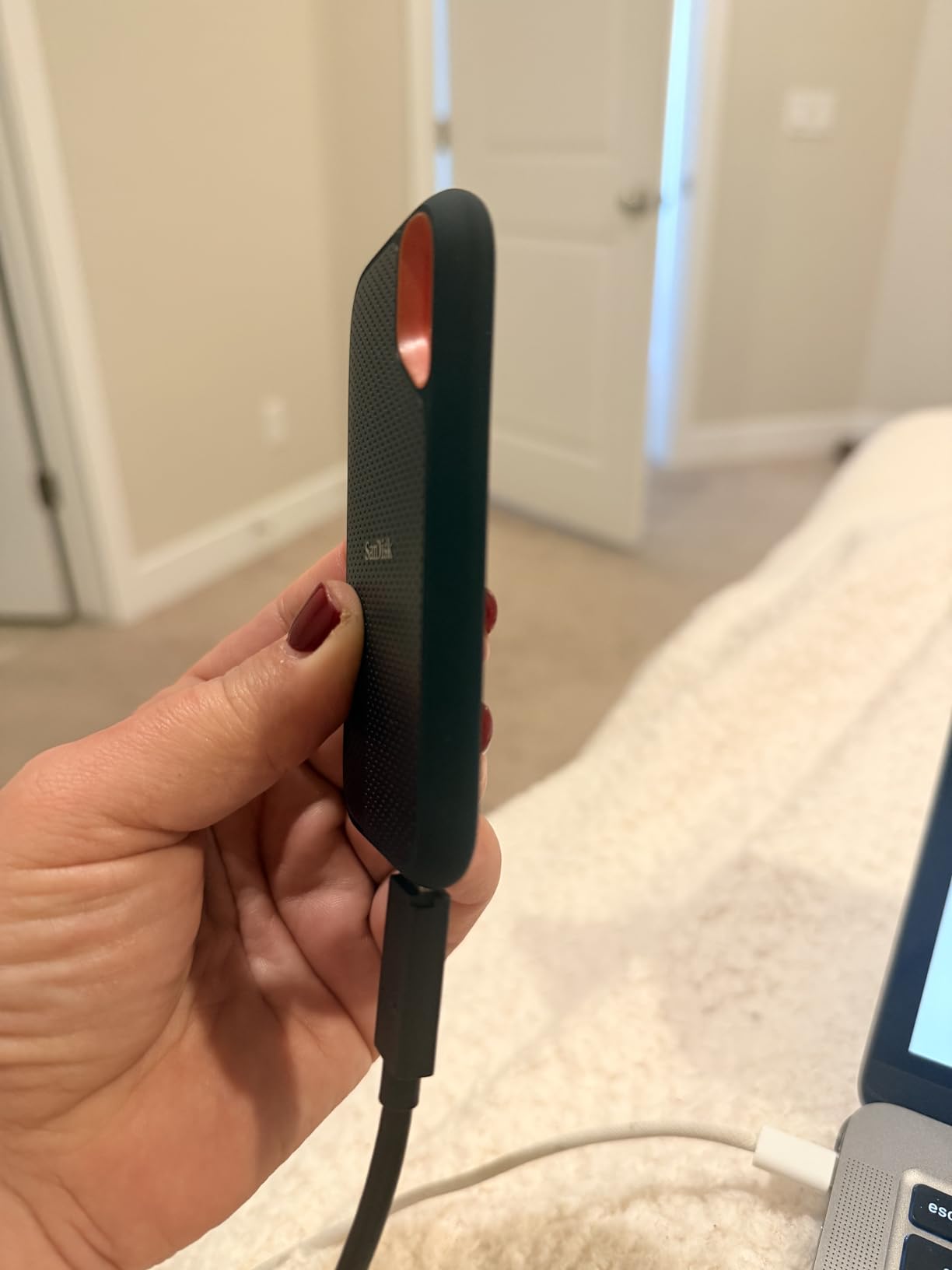 SanDisk 2TB Extreme Portable SSD - Up to 1050MB/s, USB-C, USB 3.2 Gen 2, IP65 Water and Dust Resistance, Updated Firmware - External Solid State Drive - SDSSDE61-2T00-G25 customer photo 2