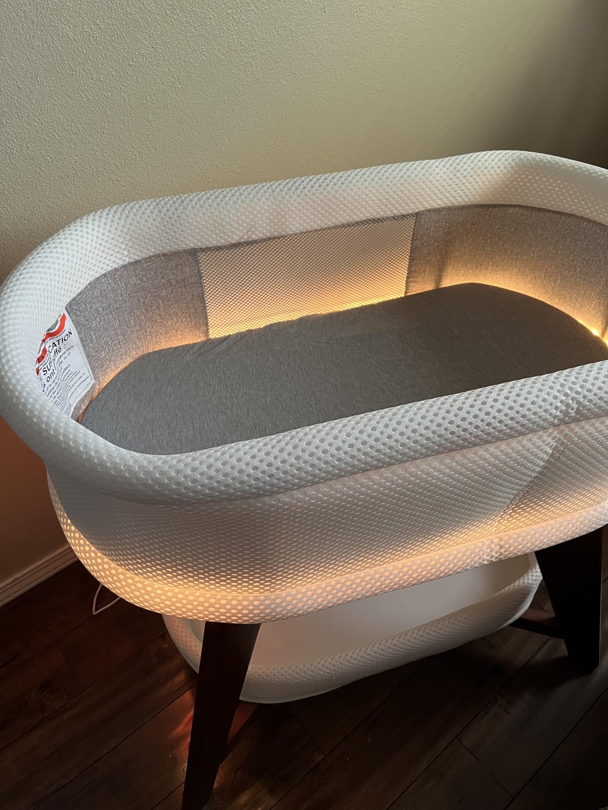 Evi Smart Baby Bassinet Beside Sleeper with Auto-Glide, Ambient Nightlight & Sensory Sounds, Compatible with Alexa and Google Home, Includes 2 Sheets (Soft White w/Espresso Legs) customer photo 2