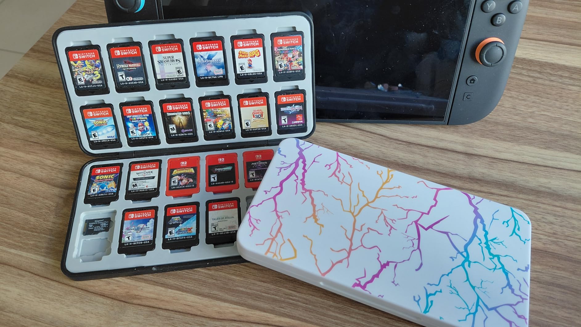 FYY Nintendo Switch Game Case Holder for Switch 2 Cartridge Case with 24 Game Card Slots & 48 Micro SD Card Slots, Hard Shell, Silicone Lining Black customer photo 1