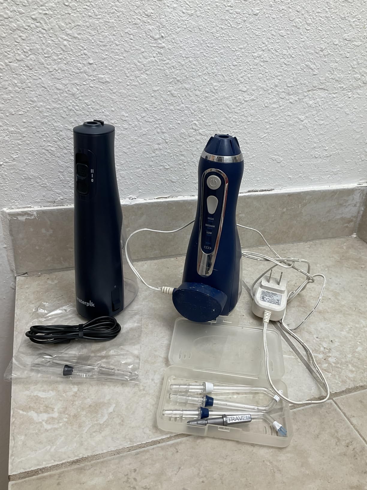 Waterpik Cordless Pulse 3100 Rechargeable Portable Water Flosser for Teeth, Gums, Braces Care and Travel with 2 Flossing Tips, Waterproof for Shower Use, ADA Accepted, WF-20 White, Amazon Exclusive customer photo 2