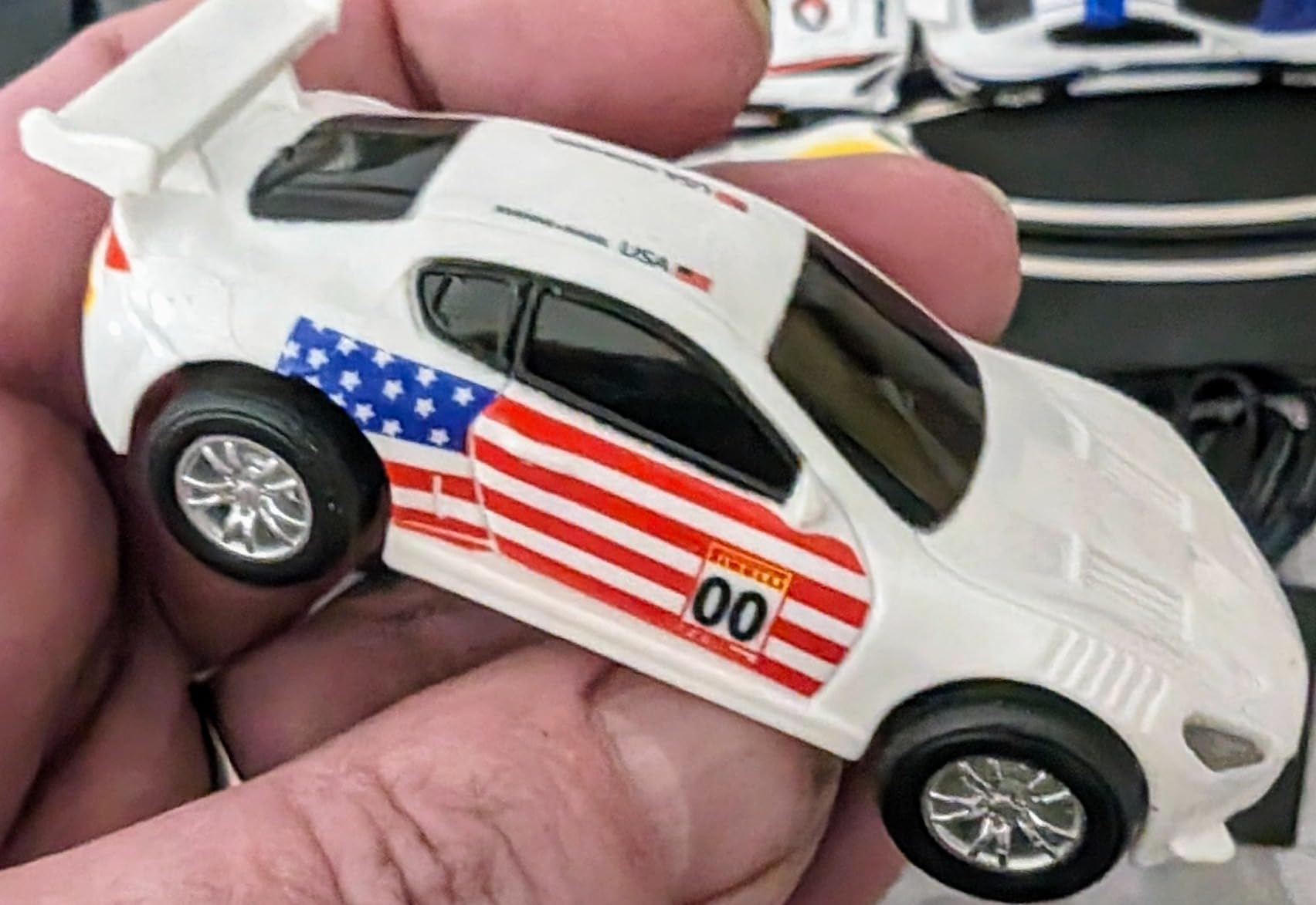 AGM MASETCH Slot Car Racing Track Set with 4 Unique Slot Cars, Battery Powered or Electric Car Track, Gift Toys for Boys Girls 8+ Years Old customer photo 1