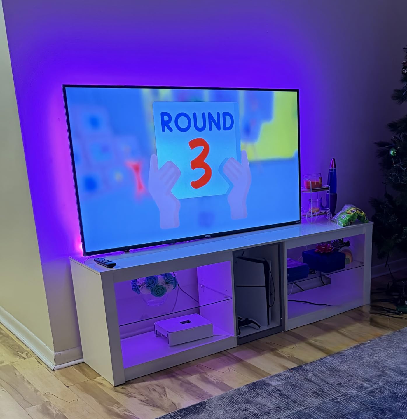 Bestier High Gloss TV Stand for 70 inch TV with Power Outlets, LED Entertainment Center for PS5, Gaming TV Consoles with Glass Shelves for Living Room, 63'' Inch, Glossy Black customer photo 2