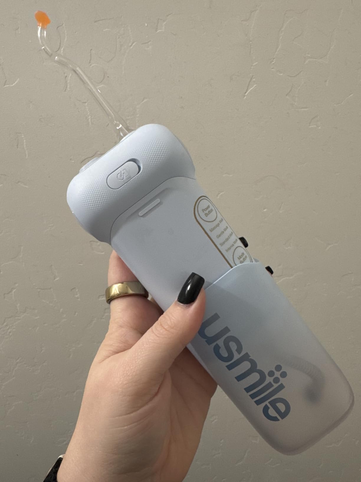 usmile C10 Portable Water Flosser - Travel-Friendly, 95-Day Battery, 4 Modes, 360° Nozzle, 180ml Tank, IPX7 Waterproof, Dentist-Recommended for Braces, Implants & Sensitive Gums (Blue) customer photo 1