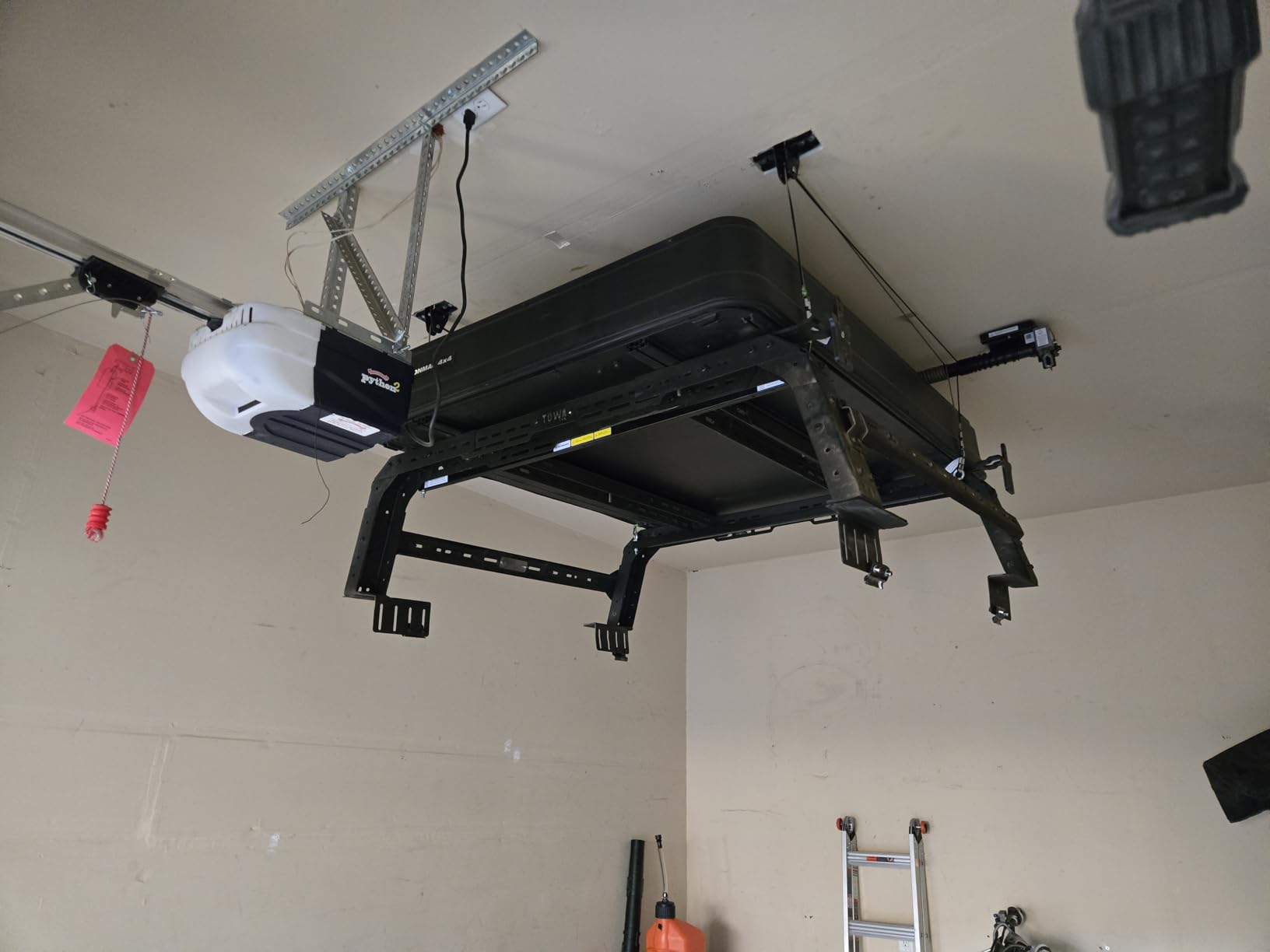 FLEXIMOUNTS Garage Ceiling Lifting Storage Rack, 4x4 Ft Heavy-Duty Metal Frame, Overhead Storage System With 350lbs Load Capacity, Matt Black customer photo 1