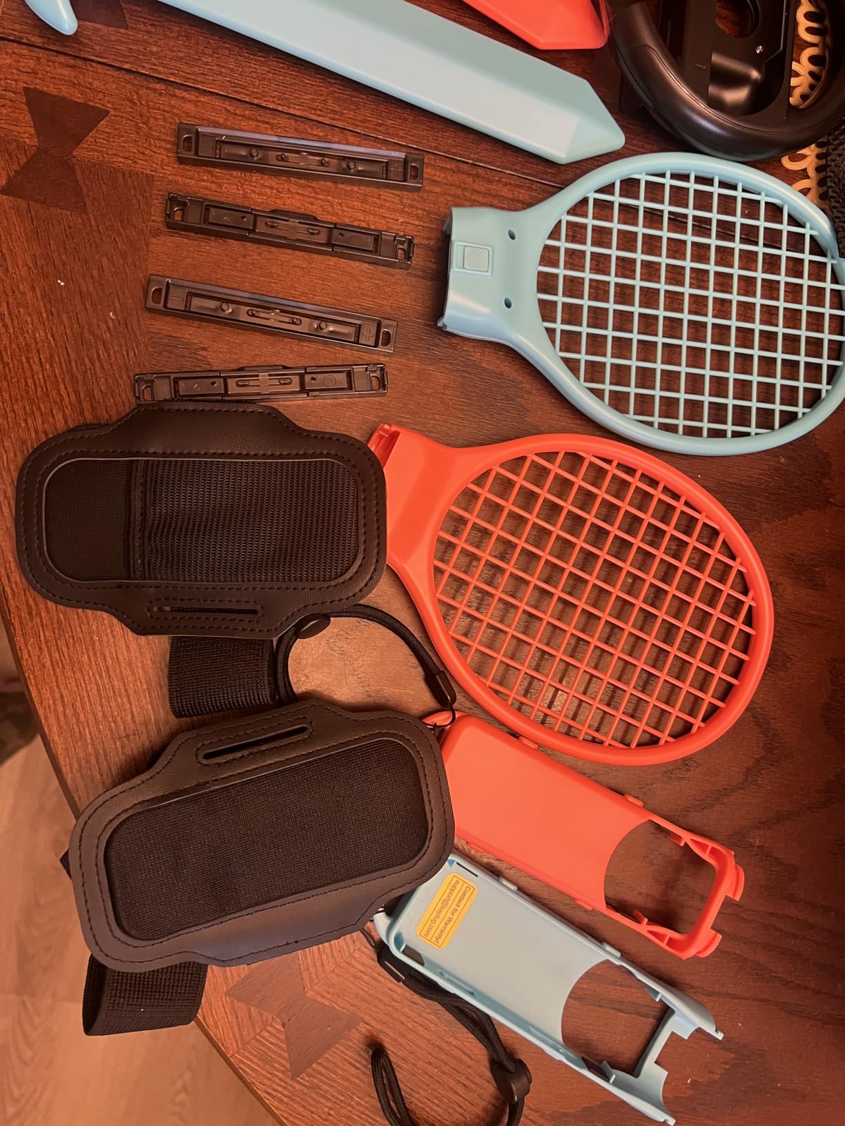 Switch 2/1 Sports Accessories, KEPLUG 20 in 1 Sports Bundle for Nintendo Switch 2/1 with 2 Joycon Grips 2 Steering wheels, Durable Family Accessories Kit, 2 Tennis Rackets, Golf Clubs 2 Swords 2 Leg Strap customer photo 2