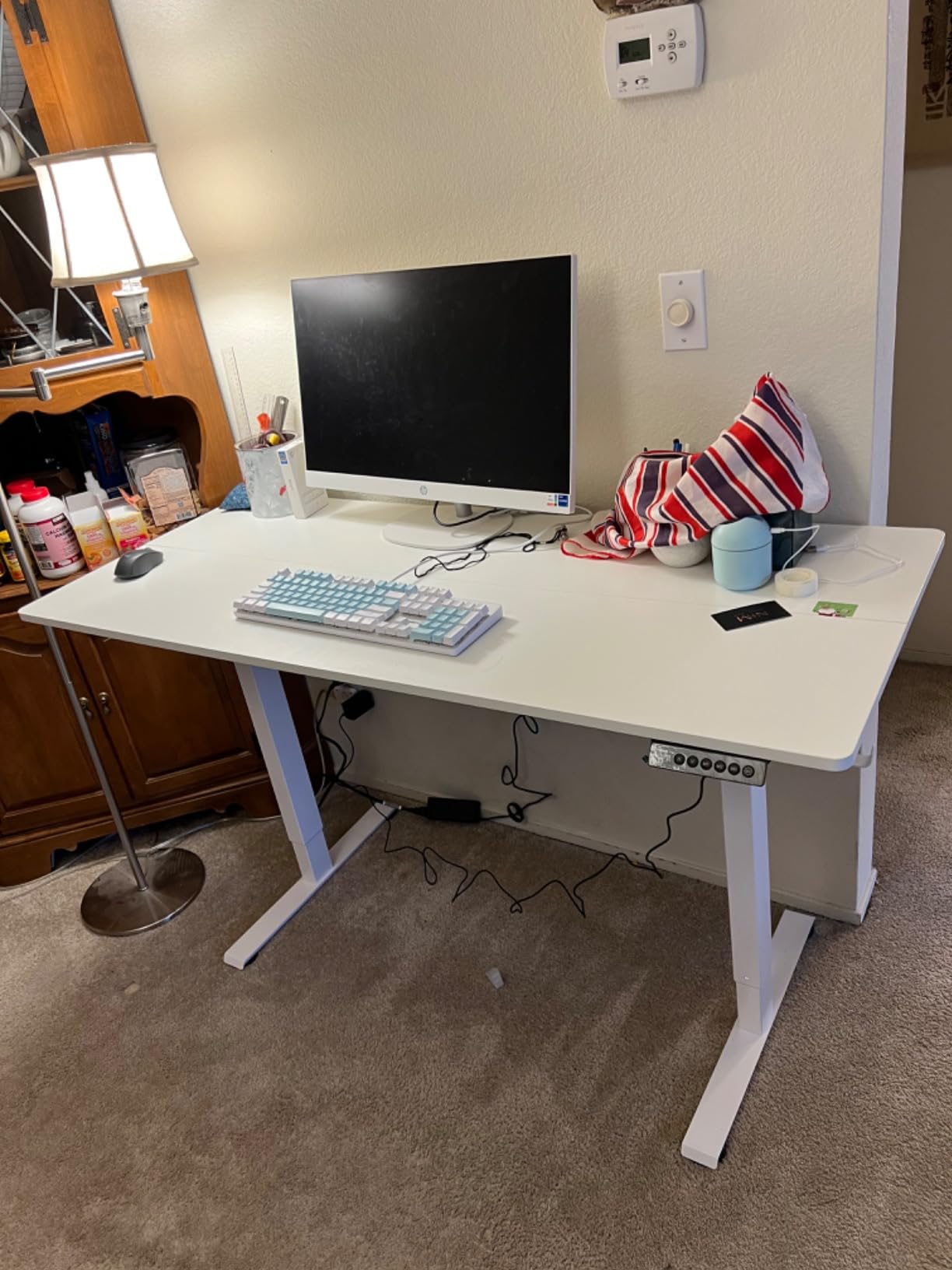 63 x 28 Inch Electric Standing Desk with 4 Wheels, Height Adjustable Desk for Home Office, Sit Stand Desk with 4 Memory Presets, Headphone Hooks and Cable Clips, Splice Board Black customer photo 2