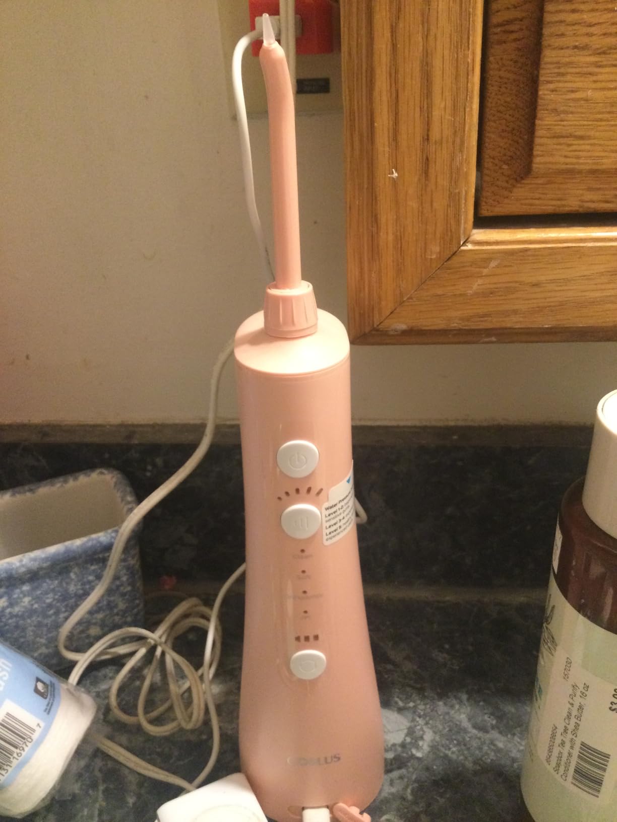 COSLUS C50 Portable Water Flosser for Teeth: 4 Modes & 5 Intensity Levels Professional Electric Dental Pick for Sensitive Gums, Braces & Orthodontic - Cordless for Travel Use, BPA-Free customer photo 1