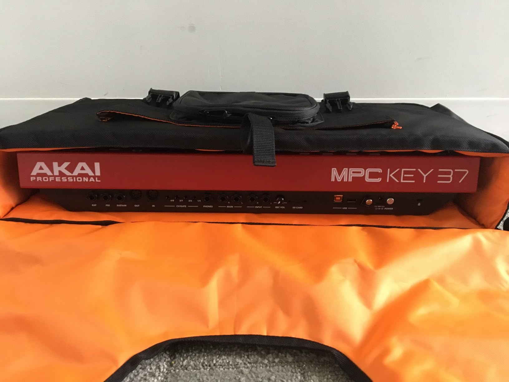Gator Cases Club Series DJ Backpack with Adjustable Interior and Bright Orange Lining Fits 27