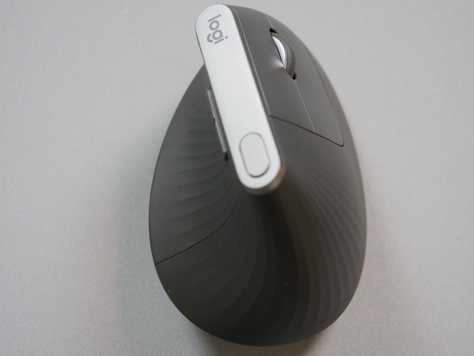 Logitech MX Vertical Wireless Mouse - Ergonomic Design Reduces Muscle Strain, Move Content Between 3 Windows and Apple Computers, Rechargeable, Graphite customer photo 1