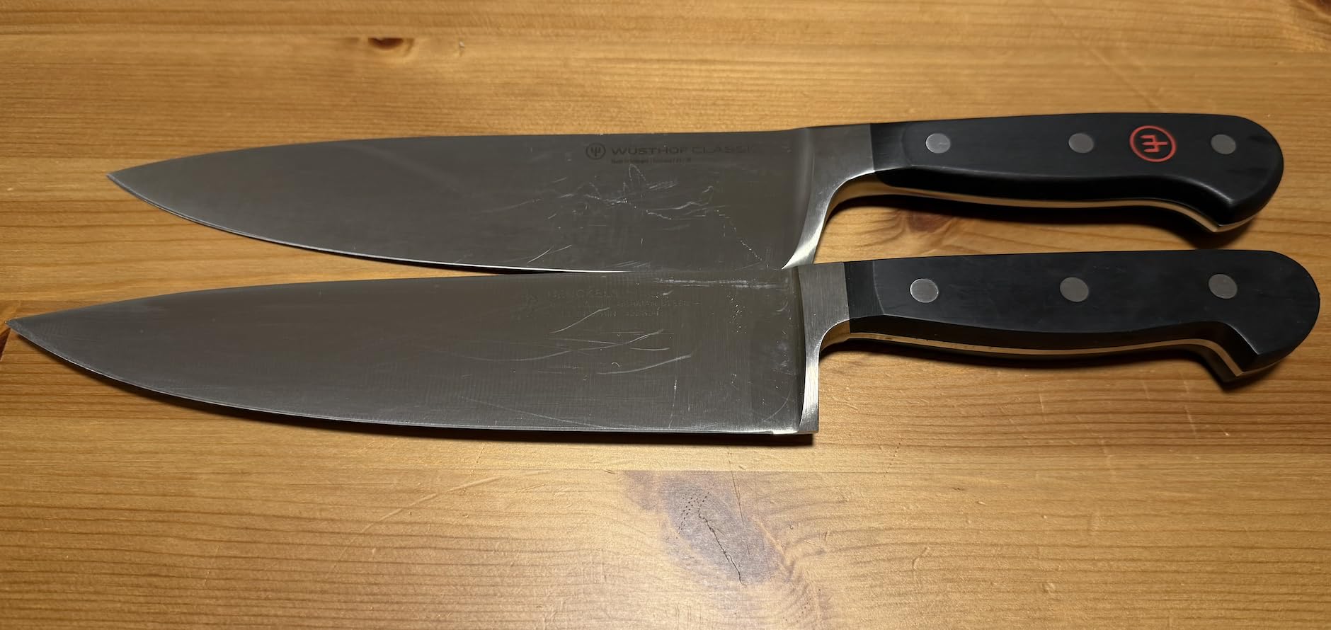HENCKELS Classic 8-Inch Chef Knife, Razor-Sharp, German Engineered | Fully Forged Construction Provides Balance with Traditional Triple-Rivet Handles Enables Comfortable Easy Cutting customer photo 1