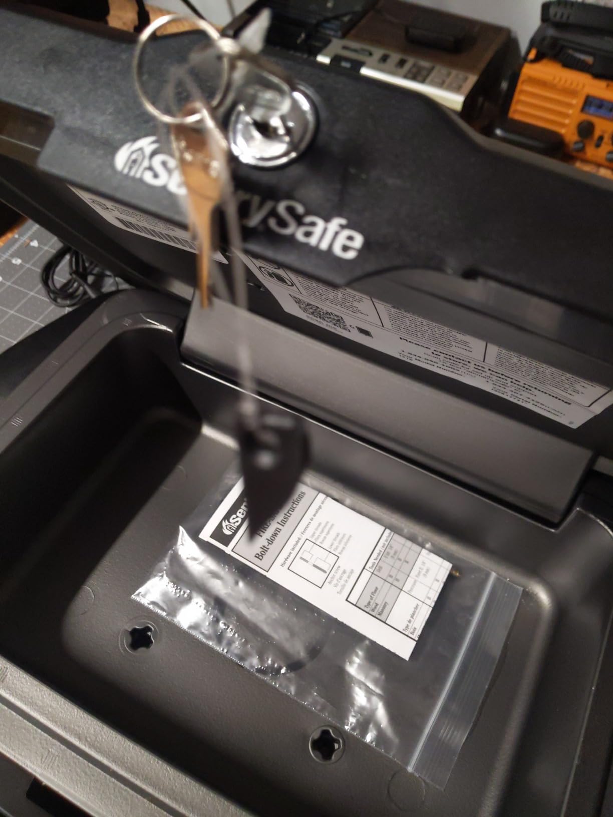 SentrySafe Fireproof Safe with Key Lock, Chest Lock Box for Home or Travel Secures Money, Documents, 0.18 Cubic Feet, 6.1 x 14.3 x 11.2 Inches, 1210 customer photo 2