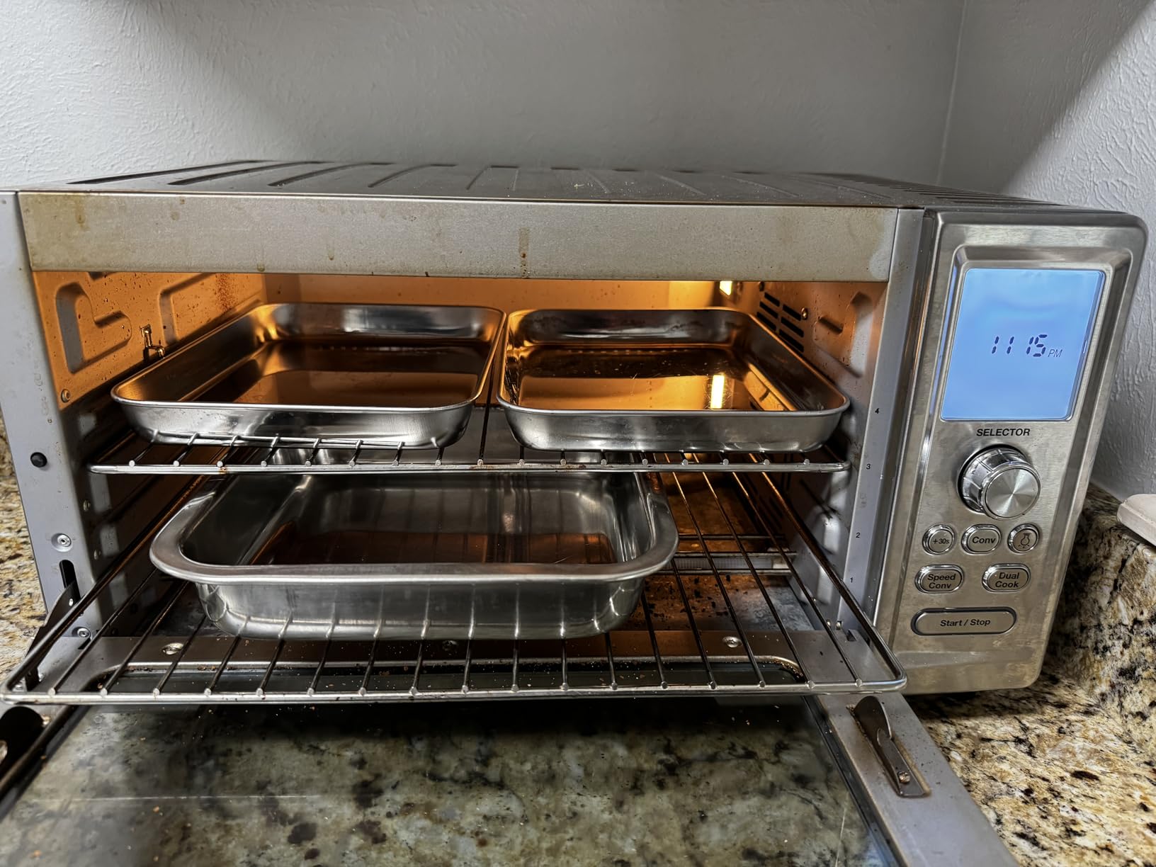 Cuisinart Convection Toaster Oven, 15-Function, 1800W, Stainless Steel | Stainless steel toaster oven with Exact Heat technology, nonstick interior fits 13