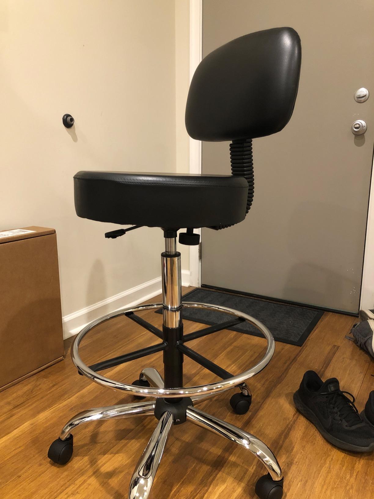 Amazon Basics Multi-Purpose Adjustable Drafting Spa Bar Stool with Sturdy Foot Rest, Back Support Cushion, 360° Swivel and Wheels, Black customer photo 2