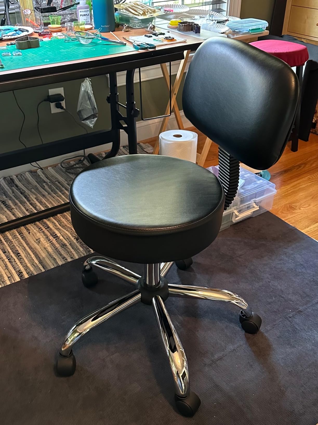 Amazon Basics Multi-Purpose Drafting Spa Bar Stool with Back Support, Upholstered, and Wheels, Black, 22.72