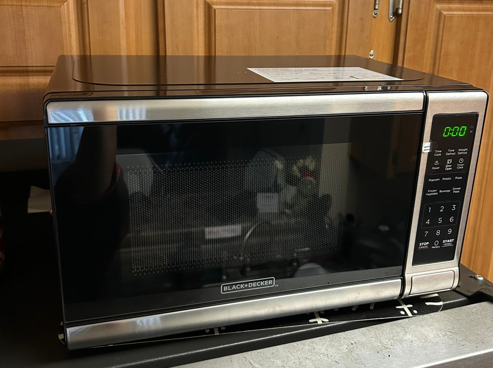 BLACK+DECKER Microwave Oven Countertop, 1.1 Cu.Ft, 1000W, Stainless Steel | Push-Button Door, Child Safety Lock, 6 Auto Cook Presets, 10 Power Levels customer photo 2