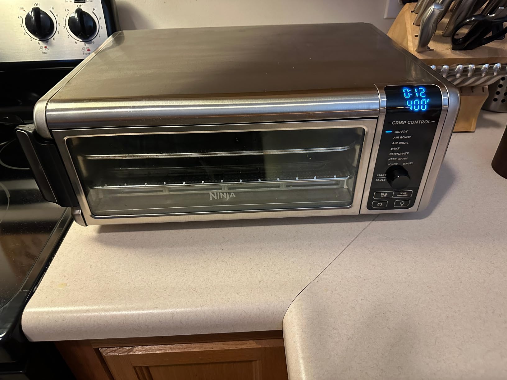 Ninja Digital Air Fry Countertop Oven, 8-in-1, XL, Silver, SP101 | Air fry, air roast, broil, bake, toast, bagel, dehydrate, keep warm, 1800W, Flip up & away customer photo 1