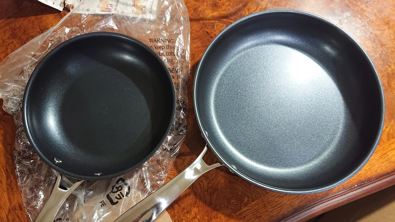 Amazon Basics 2-Piece Non-Stick Stainless Steel Fry Pan Set, Oven Safe, Induction Compatible, Stay-Cool Handles, 10-Inch and 8-Inch customer photo 1
