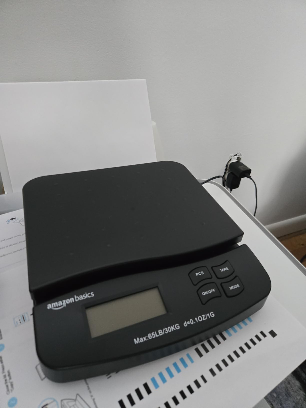 Amazon Basics Digital Postal Shipping Scale with Tare Function, AC Adapter, 65 lb Capacity, 0.1 oz Readability, LCD Display, Black customer photo 1
