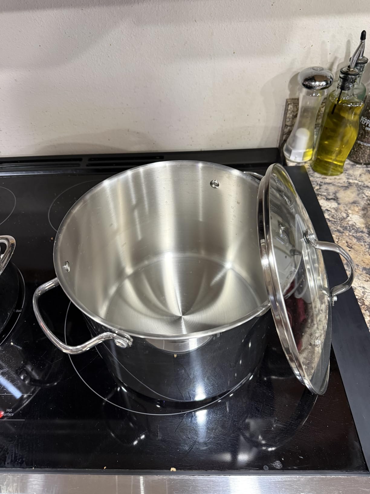 Amazon Basics Stainless Steel Induction Compatible Stock Pot with Glass Lid, Oven Safe, Dishwasher Safe, Sturdy, 8 Quart, Silver customer photo 2
