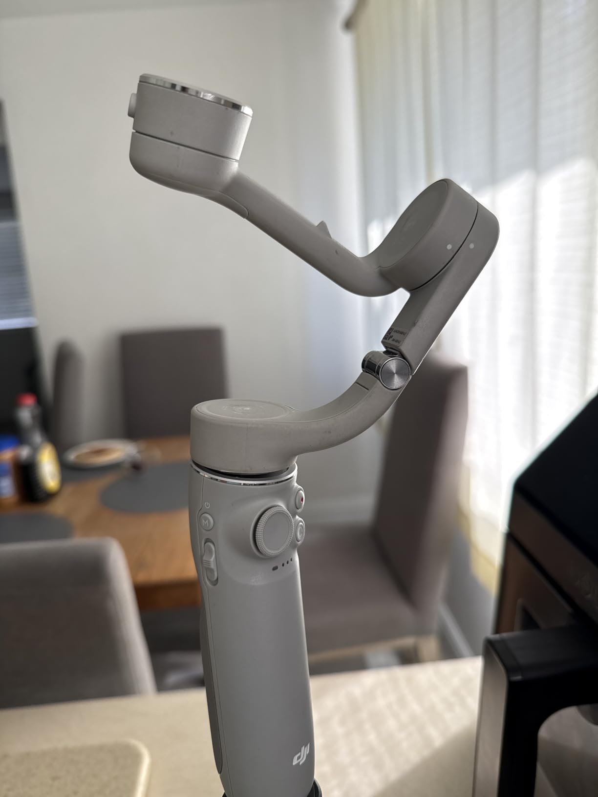 DJI OM 5 Smartphone Gimbal Stabilizer, 3-Axis Phone Gimbal, Built-In Extension Rod, Portable and Foldable, Android and iPhone Gimbal with ShotGuides, Vlogging Stabilizer, YouTube TikTok Video, Gray customer photo 2