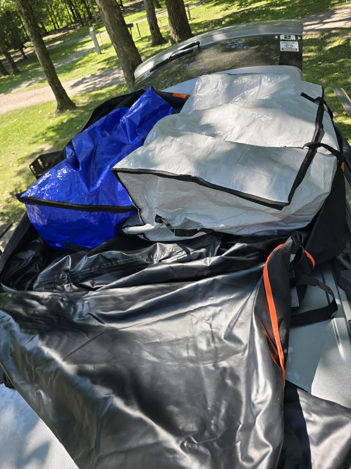 23 cft. Extra Waterproof Rooftop Cargo Carrier Bag, Double Weatherproof Zippers,10 Heavy-Duty Tie-Down Straps fit Cars with/Without a Rack or Side Rails, Safety Hooks Included customer photo 2
