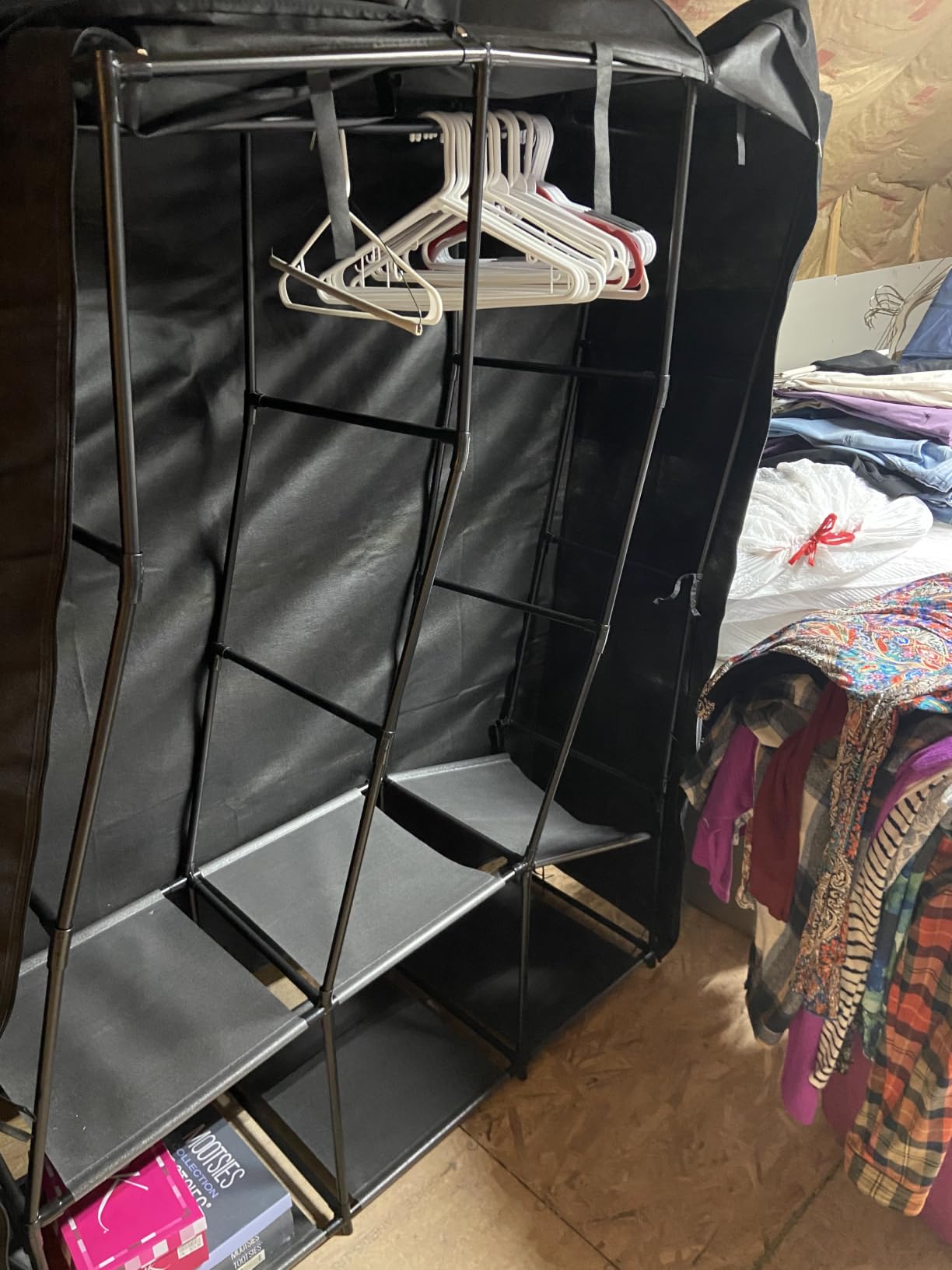 SORCEDAS Portable Wardrobe Closet Storage Organizer Metal Hanging Rack Non-Woven Fabric 34 Inch Black customer photo 1