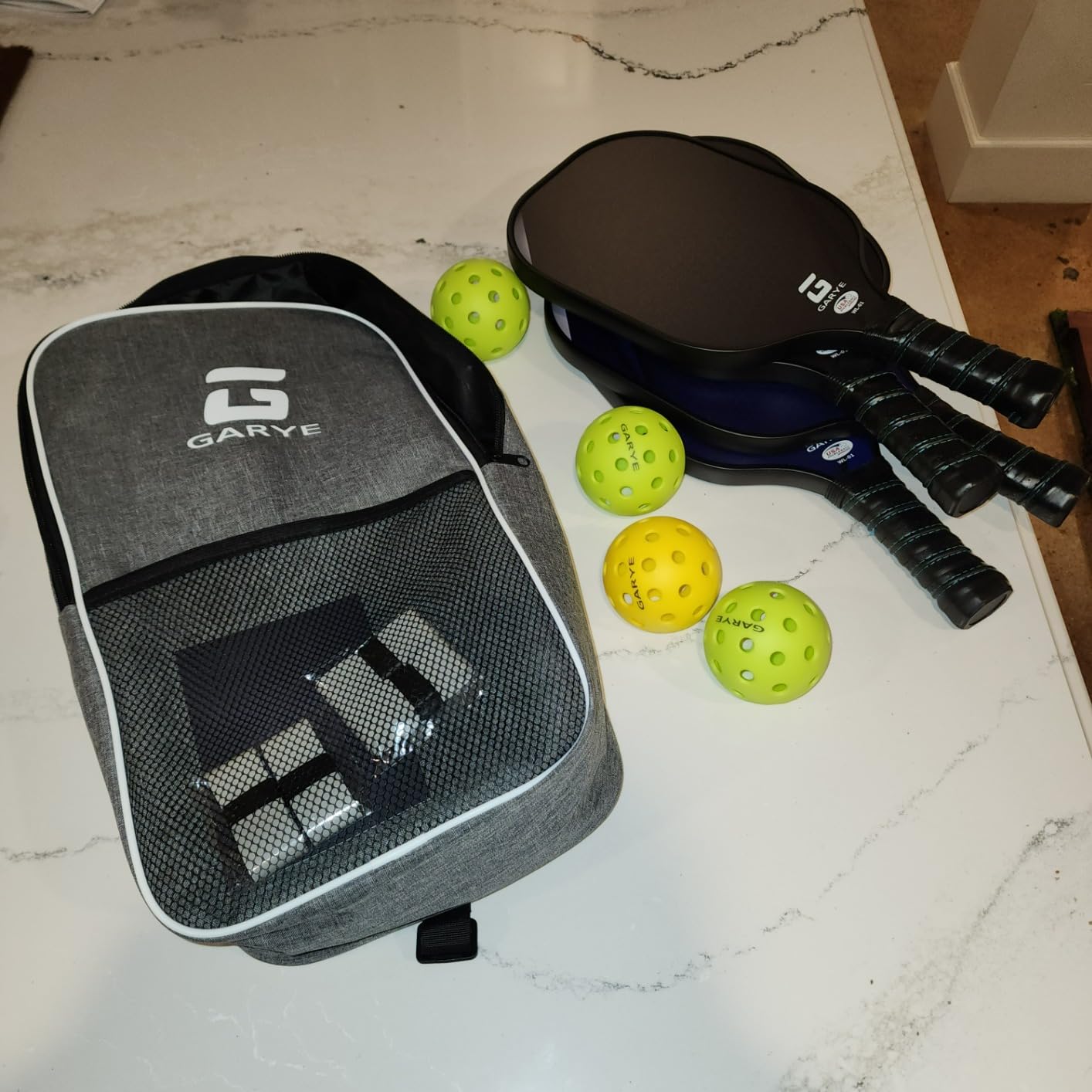 GARYE Pickleball Paddles Set of 4, Carbon Fiber Pickle Ball Paddle, USAPA Approved Lightweight Rackets 4 Pack for Adults and Teenagers, Includes 6 Balls, 1 Bag, and 4 Grip Tapes customer photo 1