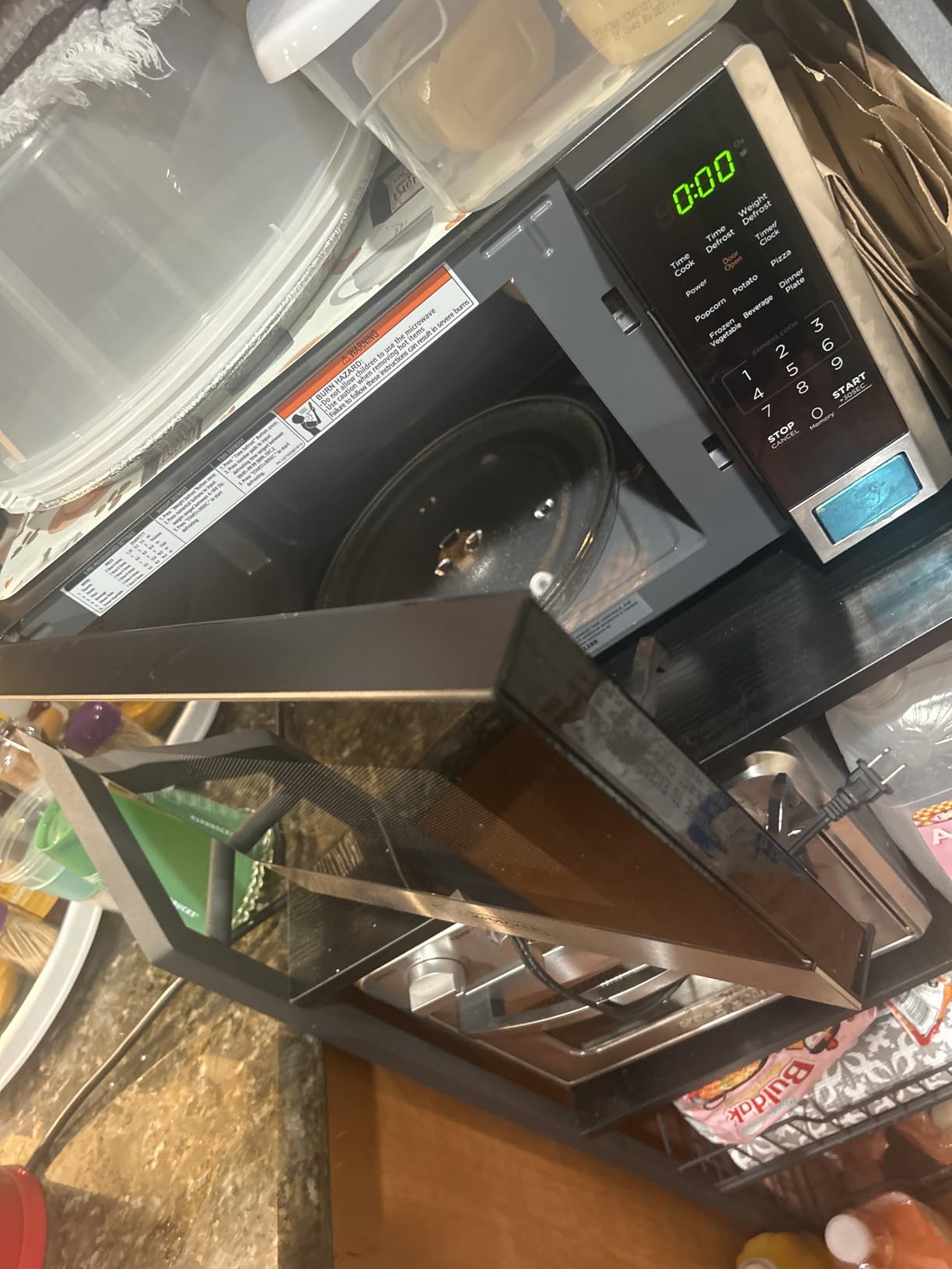 BLACK+DECKER Over the Range Microwave Oven with Vent and One-Touch Auto Cooking, 1.7 cu. ft. OTR Over Stove Microwave, Stainless Steel, 1000 Watts, EM044K6CE-SS customer photo 1