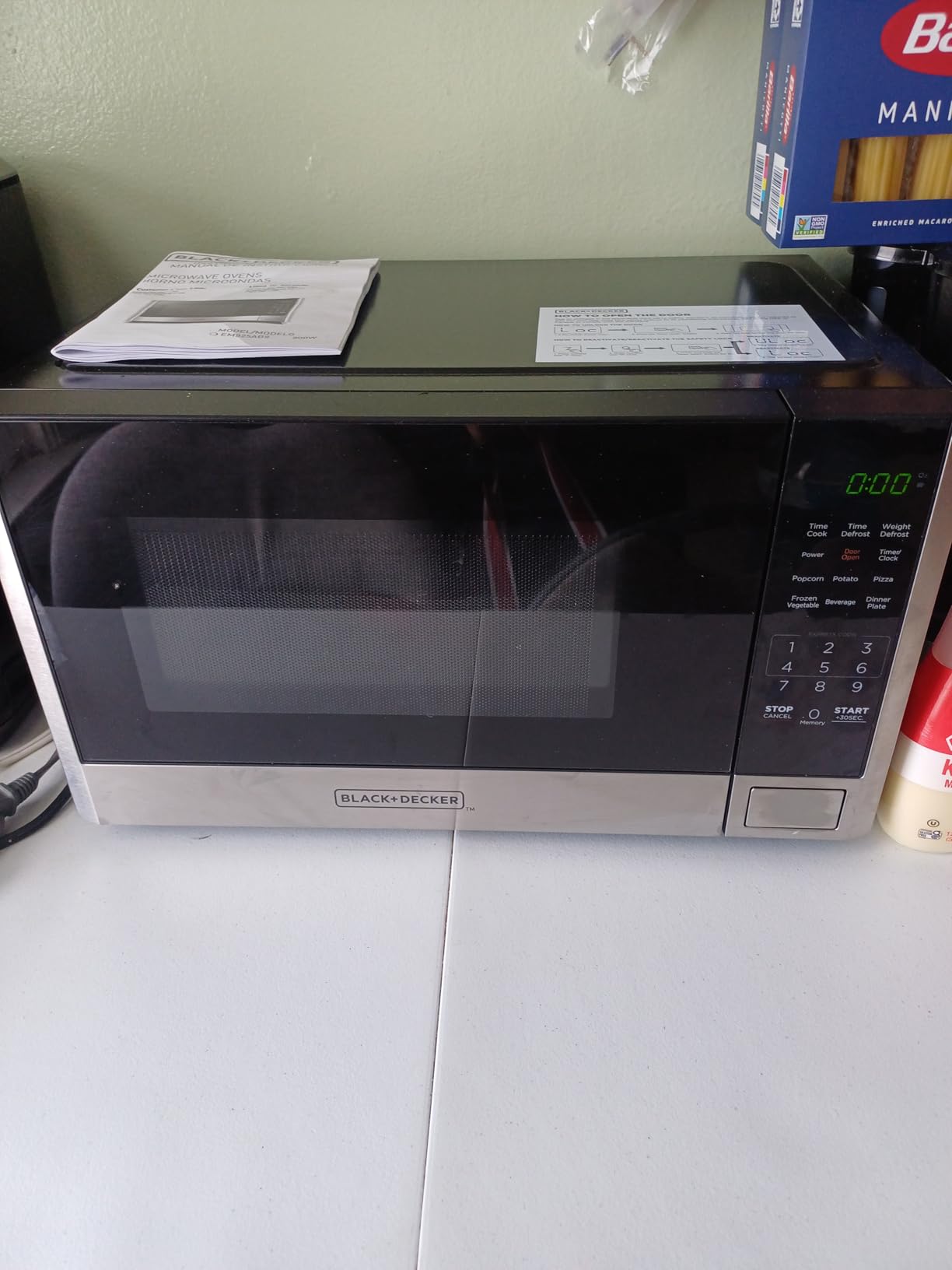 BLACK+DECKER Over the Range Microwave Oven with Vent and One-Touch Auto Cooking, 1.7 cu. ft. OTR Over Stove Microwave, Stainless Steel, 1000 Watts, EM044K6CE-SS customer photo 2