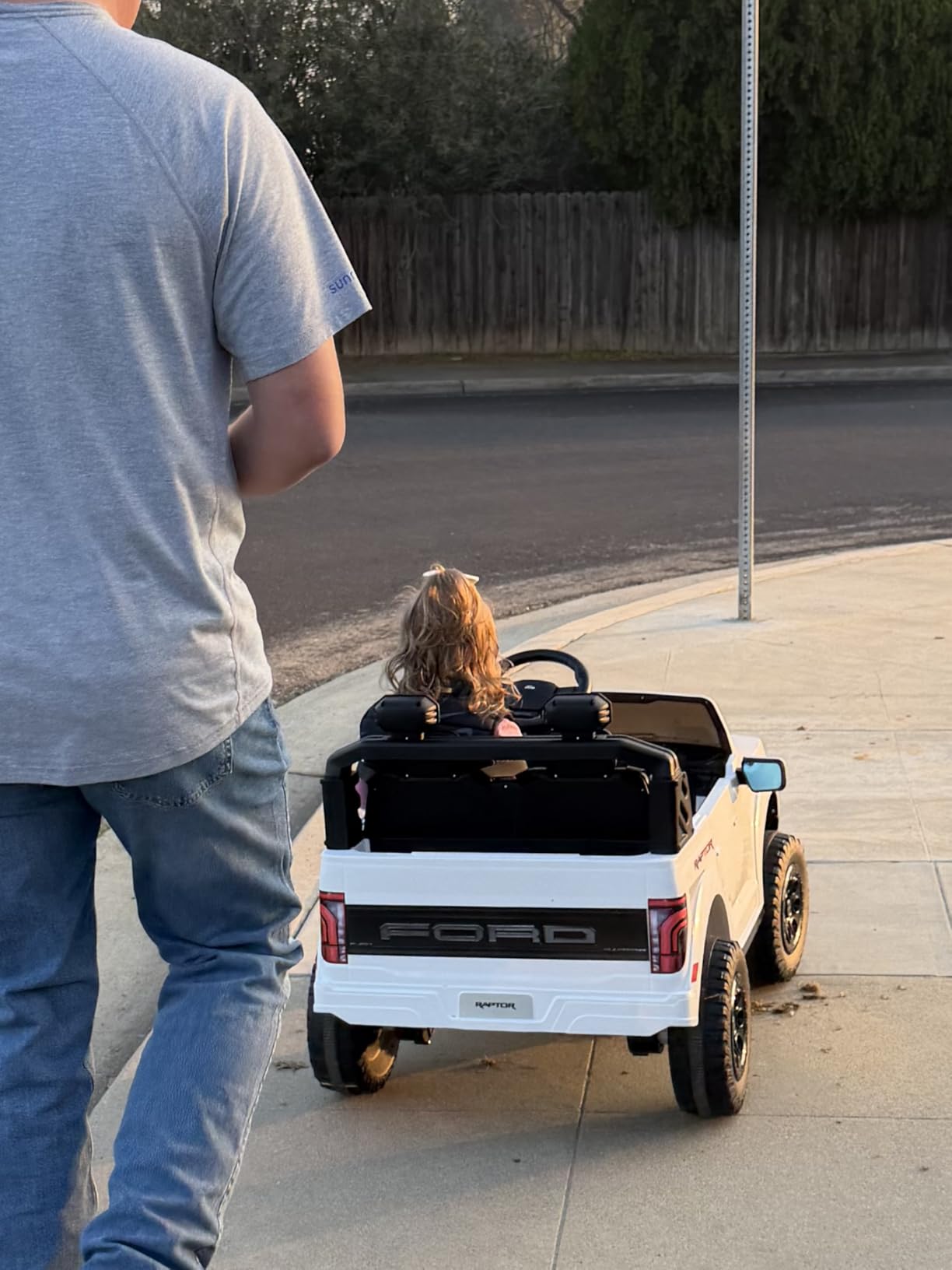 First Ride On 24V Kids Ride On Truck, Licensed Ford F-150 Raptor 2 Seater Electric Car w/Remote Control, Kids Ride On Car Toys w/LED Lights, Bluetooth, Music, Truck Bed Storage, Soft Start (White) customer photo 2
