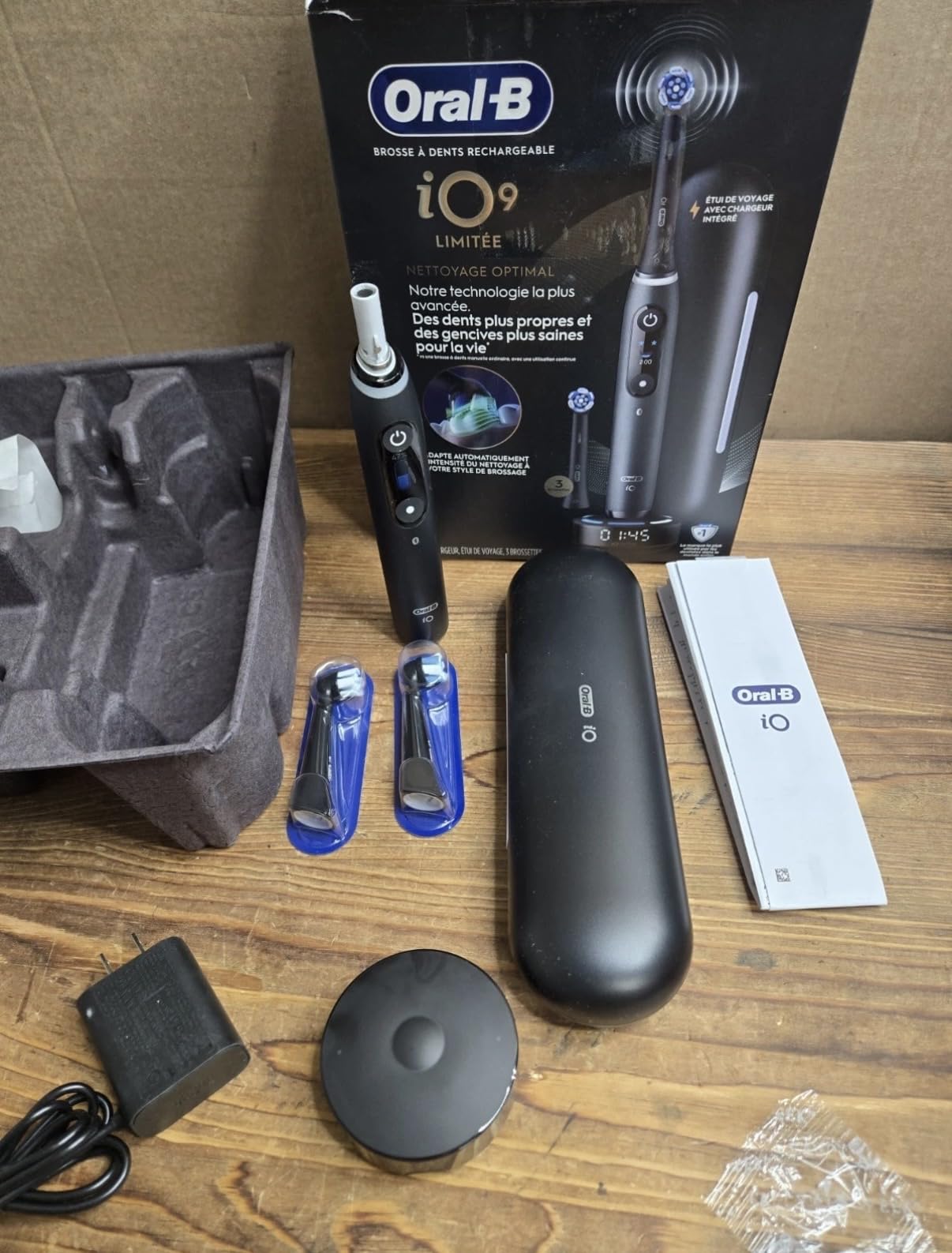 Oral-B Rechargeable Electric Toothbrush, iO9 Limited Ultimate Clean, 7 Cleaning Modes, Interactive Display, iSense Charger, Charging Travel Case, Visible Pressure Sensor, 3 Brush Heads, Black customer photo 1