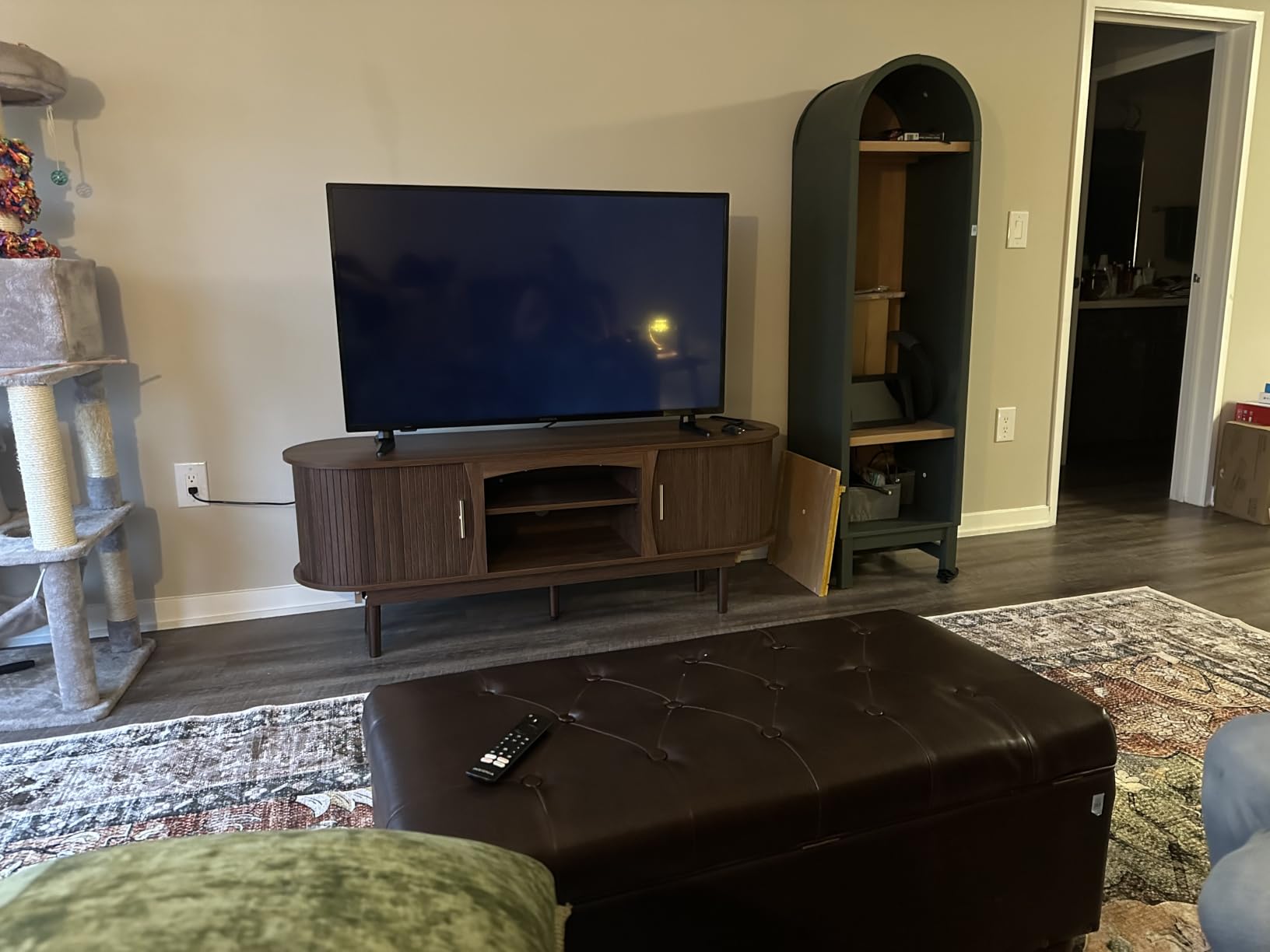 Decofy Mid Century TV Stand for TVs up to 80 Inches, Entertainment Center with Storage, Power Outlet, Fluted Sliding Doors & Adjustable Shelves, Modern Media TV Console Table for Living Room (Walnut) customer photo 1