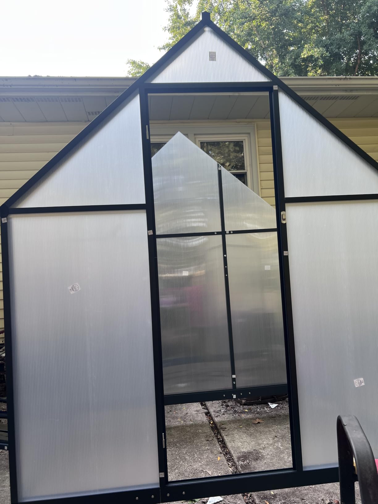 8 x 10 FT Outdoor Polycarbonate Greenhouse, Charcoal Black, Large walk-in interior, reinforced aluminum frame, double-wall PC panels, two roof vents and rain gutters help plants thrive customer photo 2
