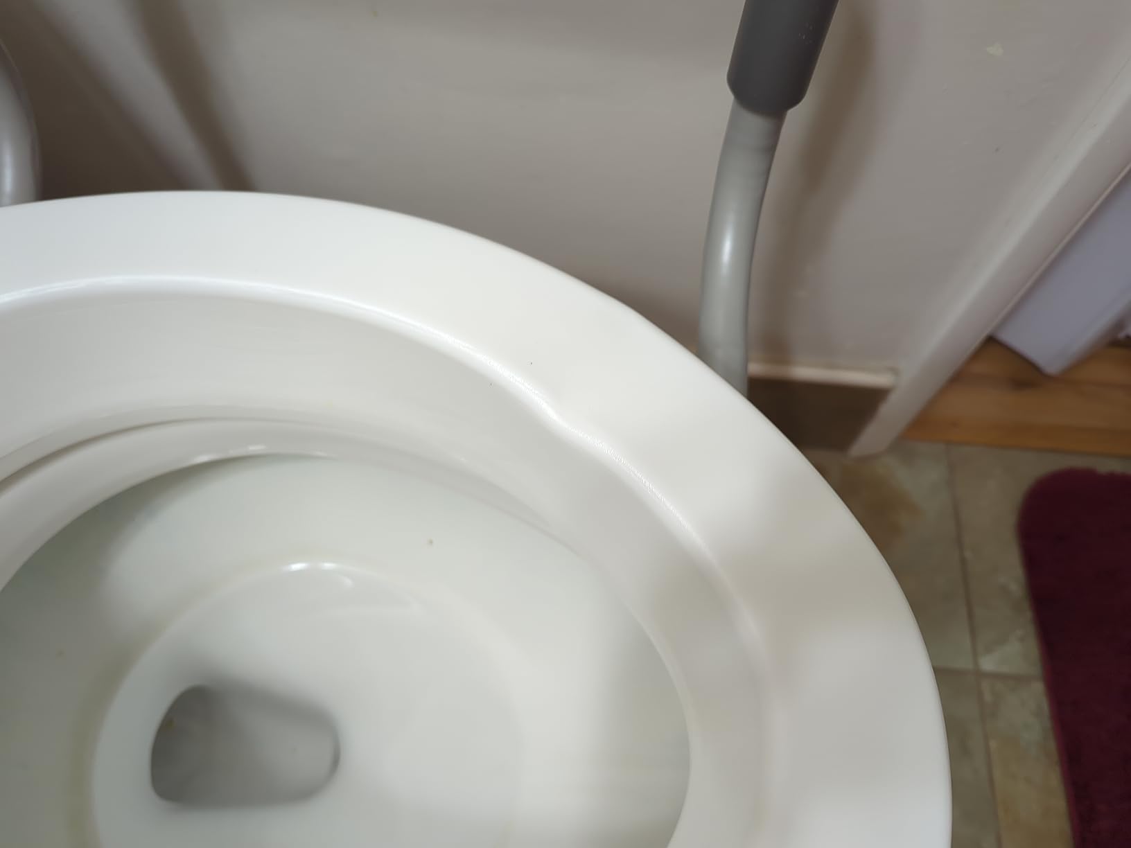 Carex 3.5 Inch Raised Toilet Seat with Arms, Elongated Toilet Seat Riser, Up to 250 lbs Capacity, Elevating & Raising Seat for Elderly & Handicap, Universal, Slip-Resistant with Padded Handles, White customer photo 1