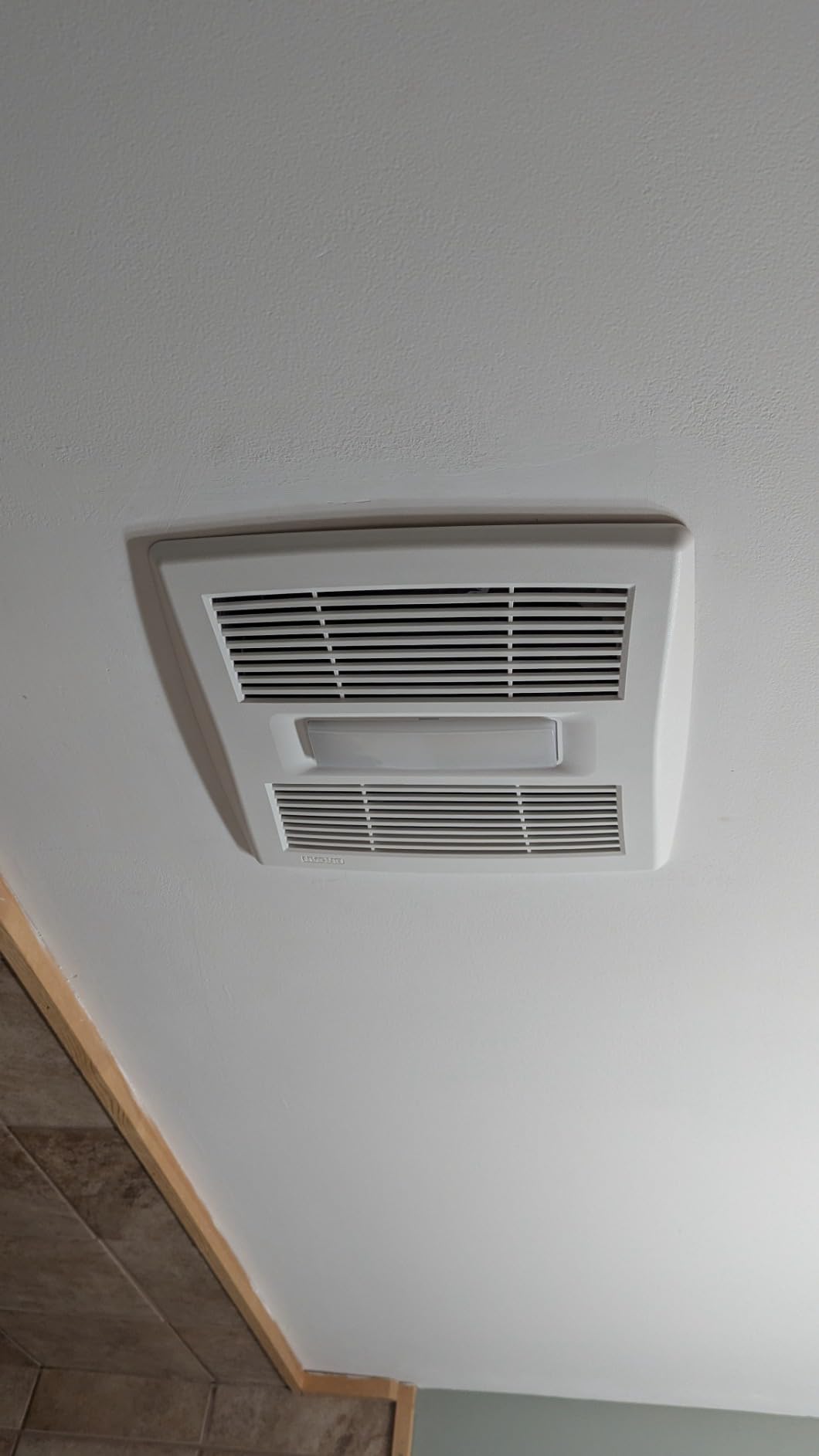 Broan-NuTone Bathroom Exhaust Fan with LED Light and Roomside Installation, Energy Star Certified, 110 CFM, Very Quiet 1.0 Sones White, AE110L customer photo 1