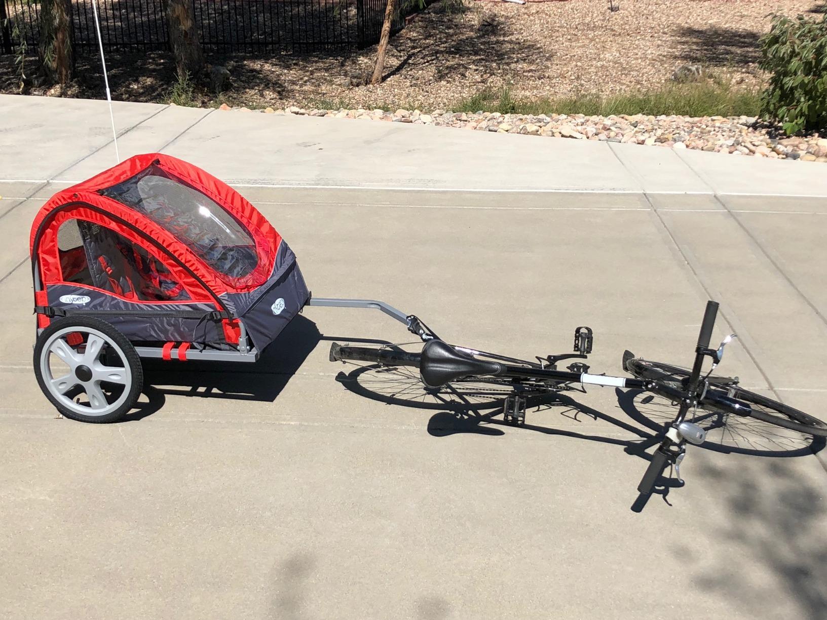 Instep Take 2 Double Seat Bike Child Trailer, Max Weight 80 lbs., 5-Point Harness, Folding Frame, Quick Release Wheels, Bug Screen & Weather Shield, Red customer photo 1