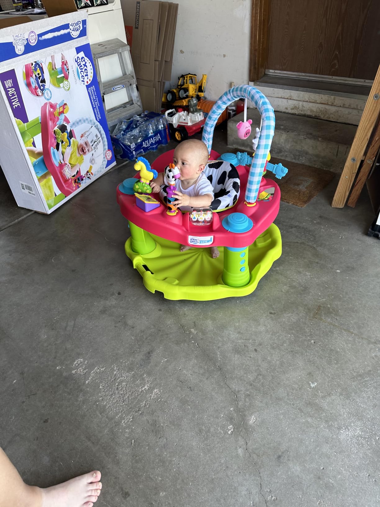 Evenflo Exersaucer Moovin & Groovin Activity Center, 25x30x30 Inch (Pack of 1) customer photo 1