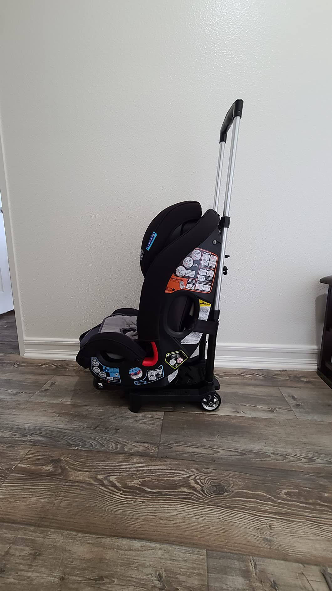 Holm Airport Car Seat Stroller Travel Cart and Child Transporter - A Carseat Roller for Traveling. Foldable, storable, and stowable Under Your Airplane seat or Over Head Compartment. customer photo 1