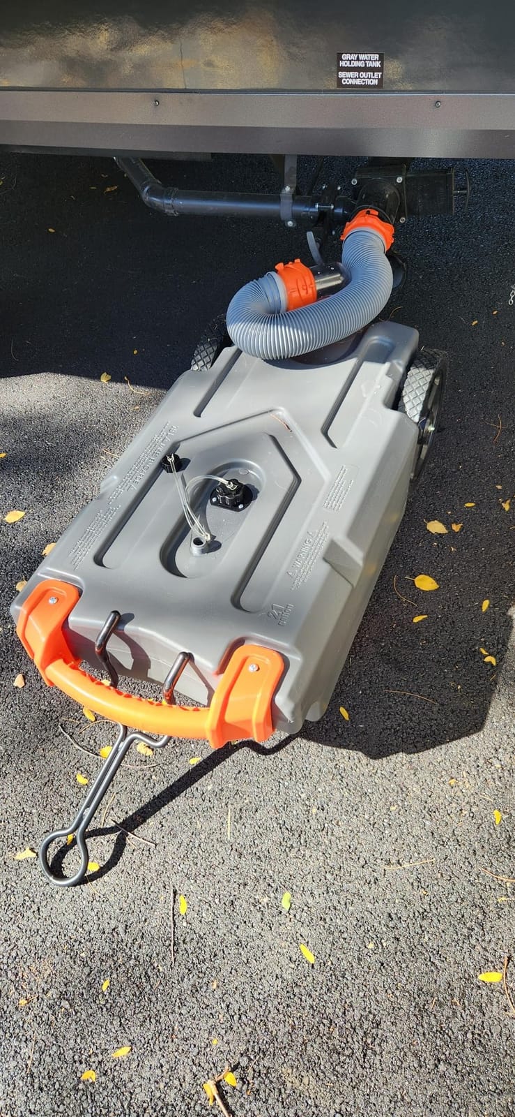 Camco Rhino 28-Gallon Camper/RV Tote Tank - Features Large Heavy-Duty No-Flat Wheels & Built-in Gate Valve - Removable Steel Tow Adapter, 3’ Sewer Hose & More RV Accessories (39004) customer photo 2